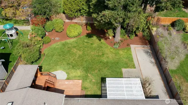 overview of the fully fenced back yard