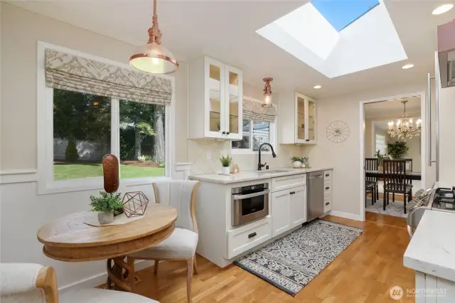 Lovely cooks kitchen with quartz counters and under counter microwave