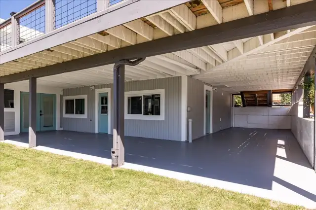 More outdoor entertaining space w/ freshly epoxied concrete floor.