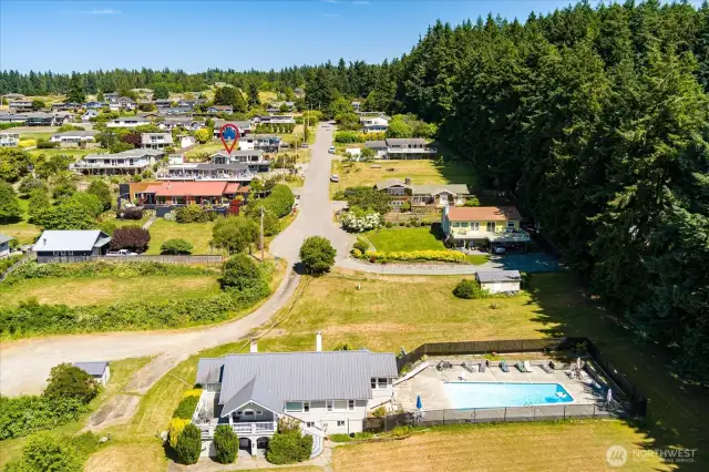 Third house on the left (sunny side of the street).