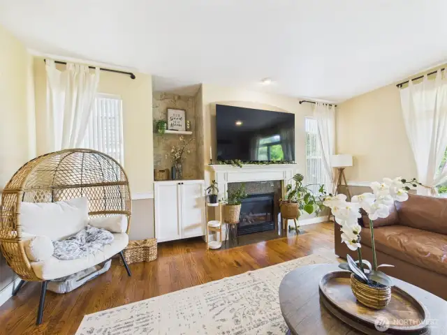 open concept living area with gas fireplace