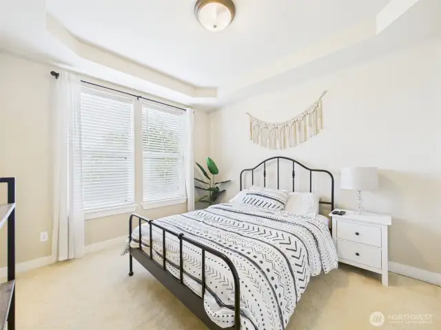 downstairs bedroom with adjacent bathroom