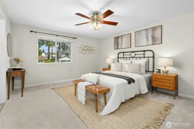 Upper level primary bedroom with ensuite bathroom