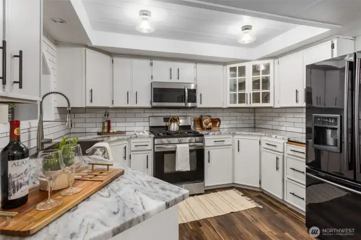 Bright, updated kitchen perfect for hosting!
