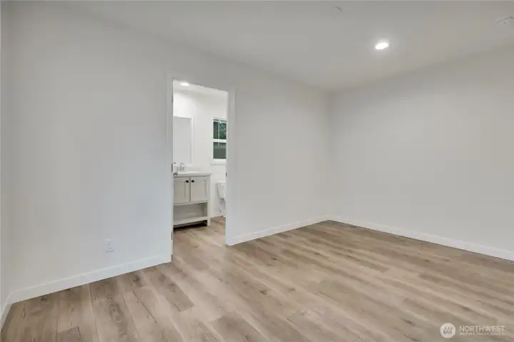 Primary bedroom with en-suite bath