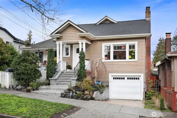 Welcome to this light-filled, extensively remodeled and much-loved Green Lake Craftsman!