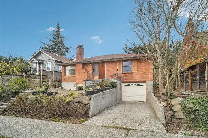 Opportunity knows no bounds in this quintessential Green Lake mid-century home!