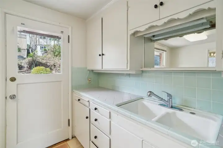 A door out to the backyard would make it so easy to host summer BBQs and happy hours with friends.