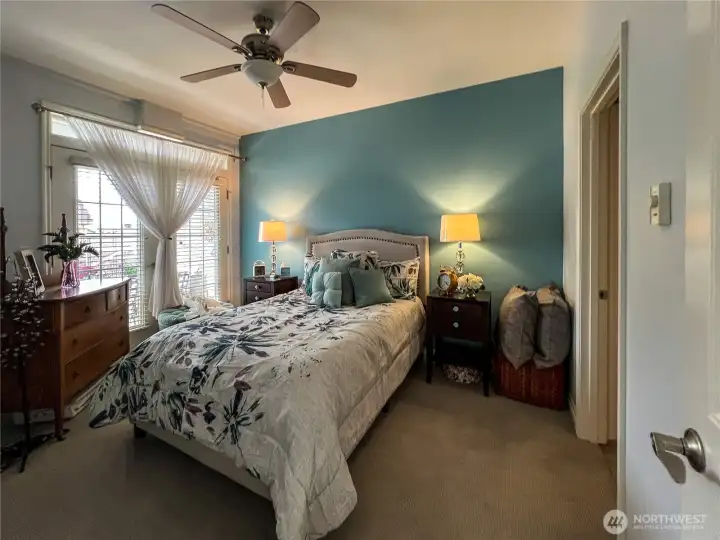 Primary Bedroom with double french doors  leading to private deck