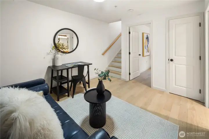 All right, let's head back up the stairs out the front door and then into the main building to check out the amenities. Again front entrance to the main building is just two doors west. Additionally, you can also access the main building lobby from the garage located right near your parking space