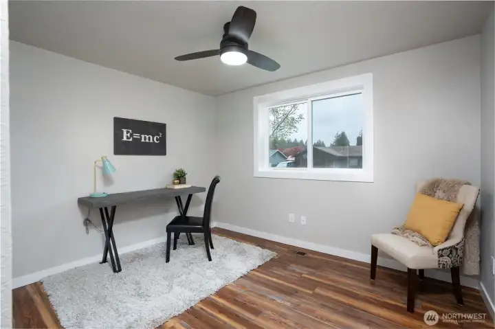 Bedroom two, adjacent to bedroom one is facing the front yard.