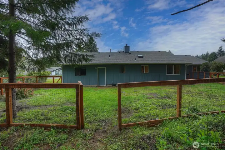 Gate to access backyard from the greenbelt potion of the property.