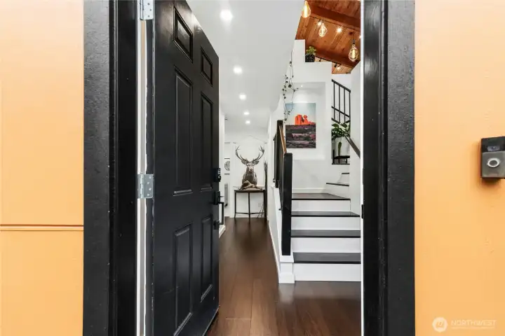 Front door entry with custom lighting.