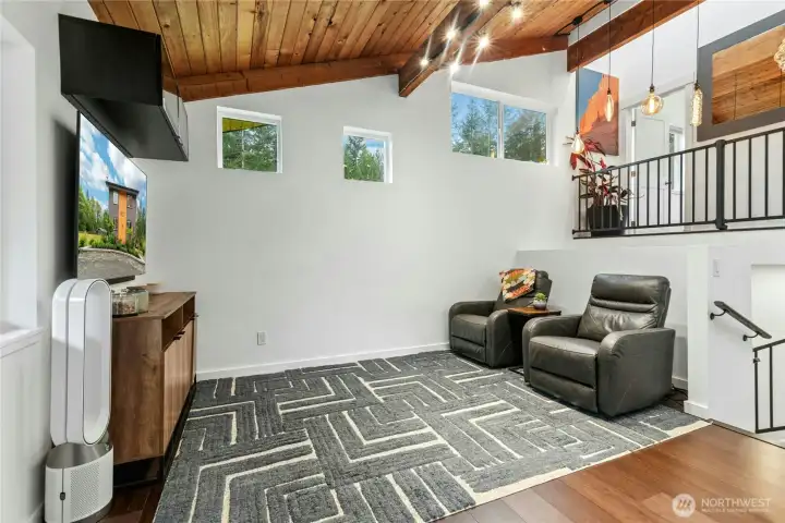 Vaulted wood ceilings with pouring natural light from all around.