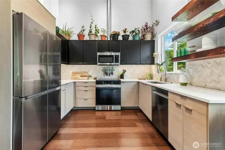 Quartz counters, stainless steel appliances, new cabinets, and more!