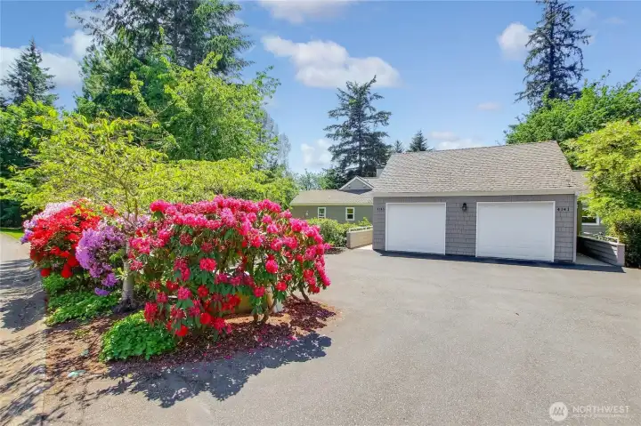 Ultimate privacy, light-filled updated one level end unit condo.