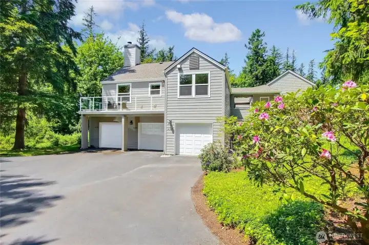 Corner upper unit with wrap-around deck with highly desired southwest exposure!