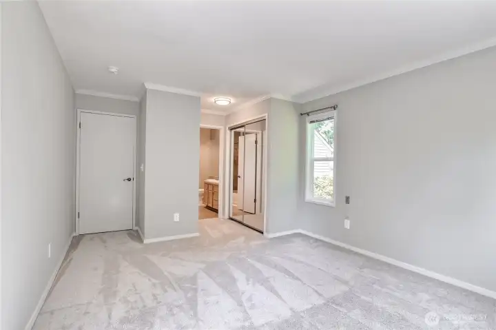Primary bedroom suite offers plentry of closet/linen space.