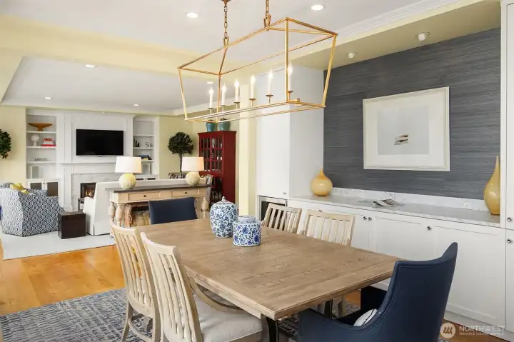 stunning seagrass blue wallpaper, built-in cabinetry and designer lighting.