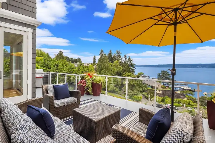 Sunny deck runs the entire length of home.
