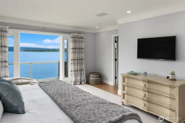 French doors open to balcony with unobstructed views.