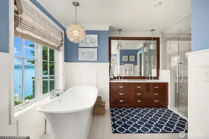 Primary bath offers soaking tube, separate shower and double sinks.
