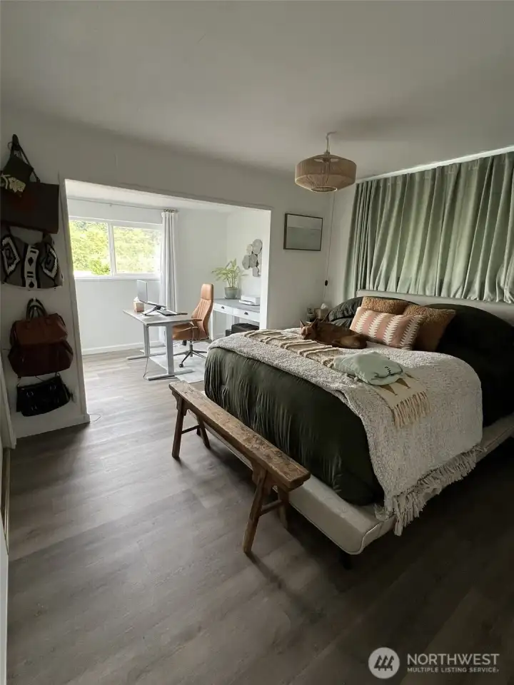 Flex space with previous furnishings shown to help visualize room scale and design possibilities.