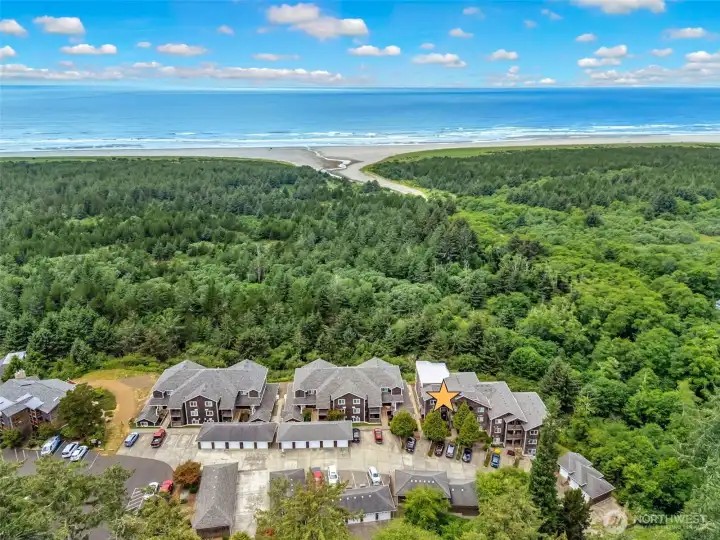 Enjoy low-maintenance coastal living with ocean views, beautifully landscaped grounds, and easy access to Long Beach beaches, golf, dining, and outdoor recreation.