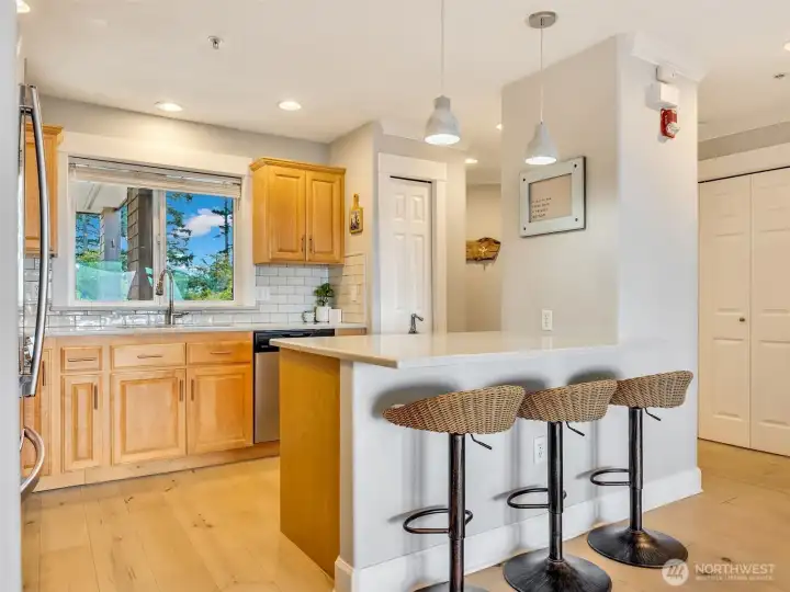 Functional kitchen with ample storage and an open layout that connects beautifully to the main living area.