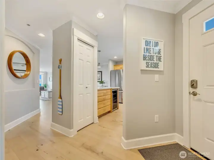 Bright entryway opens to an inviting floor plan designed for comfortable coastal living.