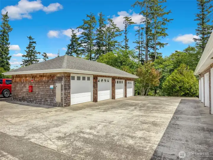 Detached single car garage included for parking or extra storage space.