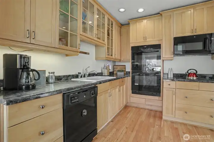 Kitchen has newer appliances and lots of cabinets for storage