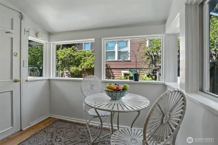 Breakfast nook and access to the side and backyard.