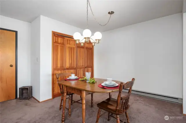 Dining with large storage closet. Hot water tank located here as well.