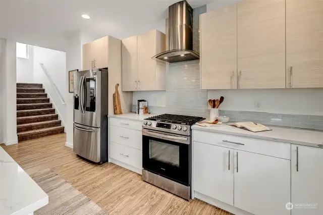 Polished granite countertops, gas range, SS appliances make this a dream kitchen!