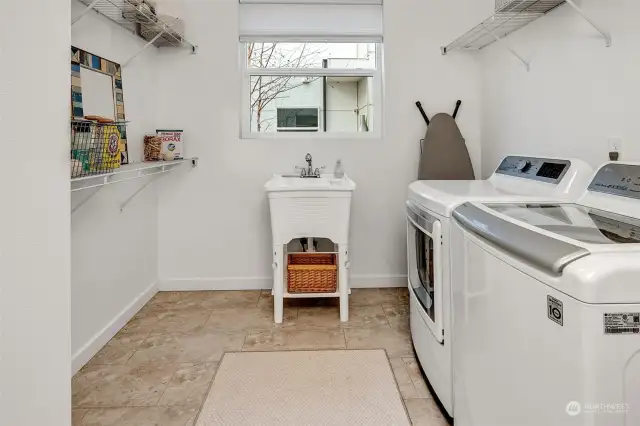 Lage laundry room is located on the entry level.