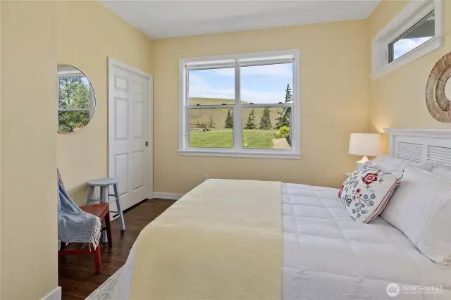 Bright and airy guest bedroom with plenty of space for rest and relaxation. Perfect for family visits or a home office.