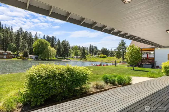 Unwind on the back porch while soaking in 75 feet of beautiful waterfront scenery.