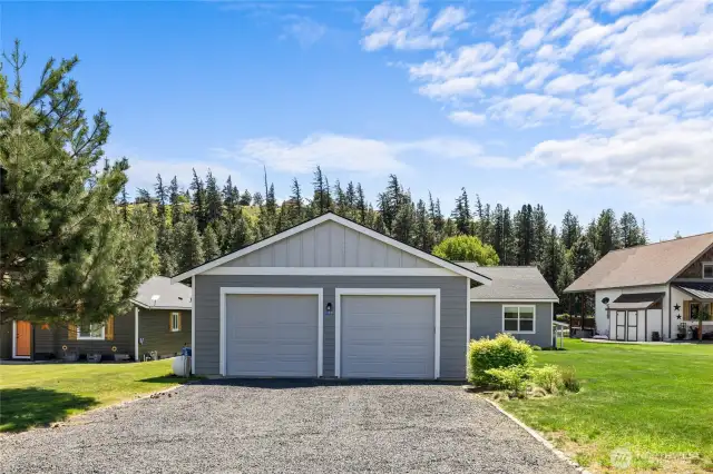 Attractive garage exterior complements the home’s style with matching siding and functional design.