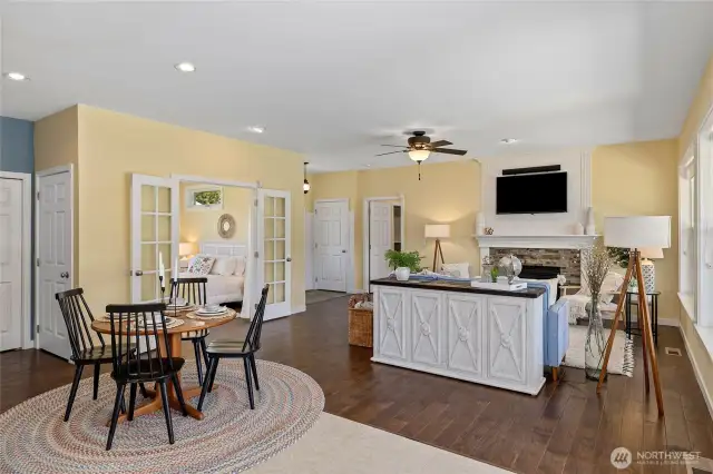 Open-concept living area and dining with an airy feel.