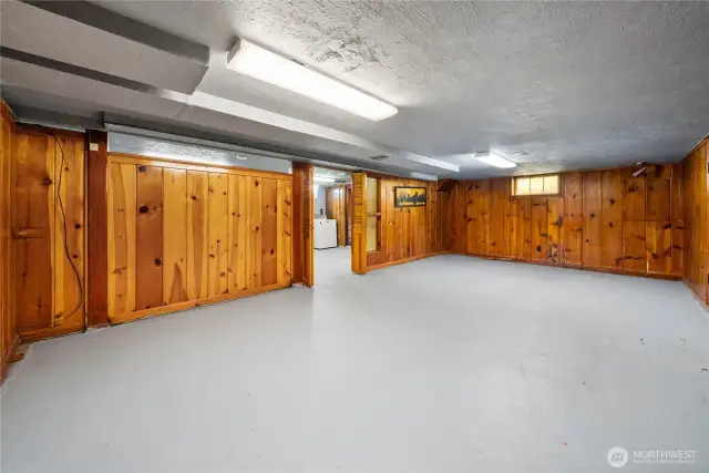 Finished basement area with bar area. Perfect for your entertaining space.