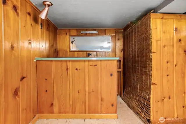 Great entertaining space. Bar area and add a pool table and a couch down stairs.