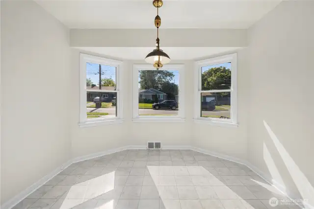Large coved dining room off kitchen. Entire floor freshly painted.