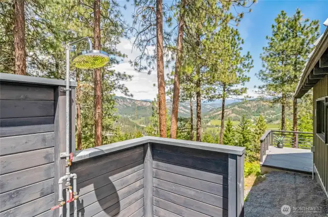 Outdoor shower with mountain views