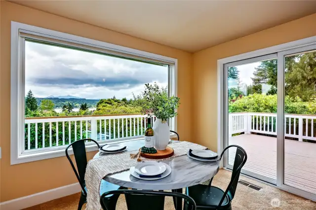 Dining area in-between kitchen and living room.