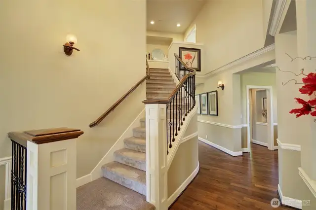 Gently curving staircase to the upper level