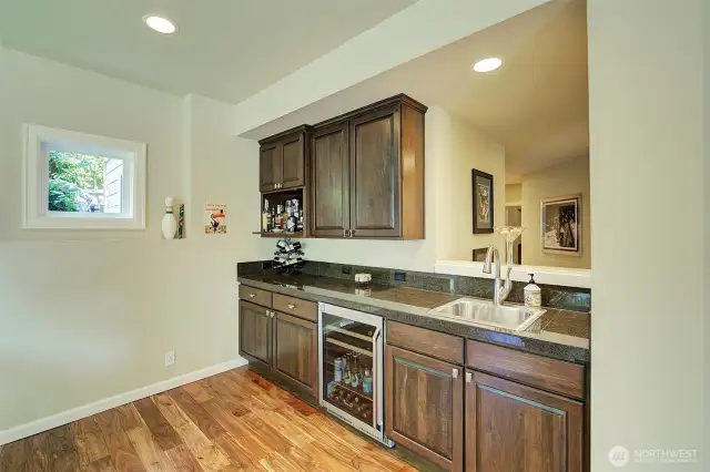 Snack/beverage center could be converted to a small kitchen for a MIL suite/apartment