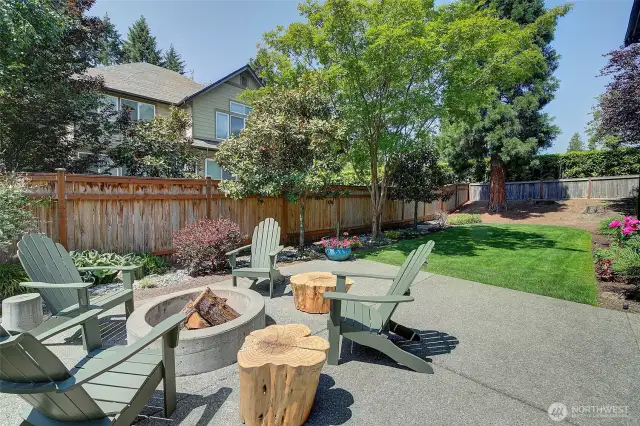 Level backyard has balance of hardscape and landscape