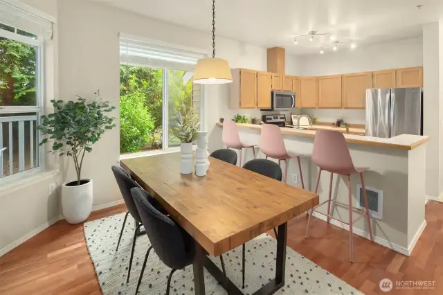Great dining areas here! Large enough to fit a very nice sized table and with the breakfast bar and patio, you have room to entertain!
