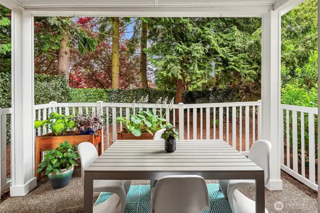 Your spacious, fenced patio offers garden boxes and is the perfect spot to share a meal or have your morning coffee. Grow your own herbs here. Easy access to let your dog out!